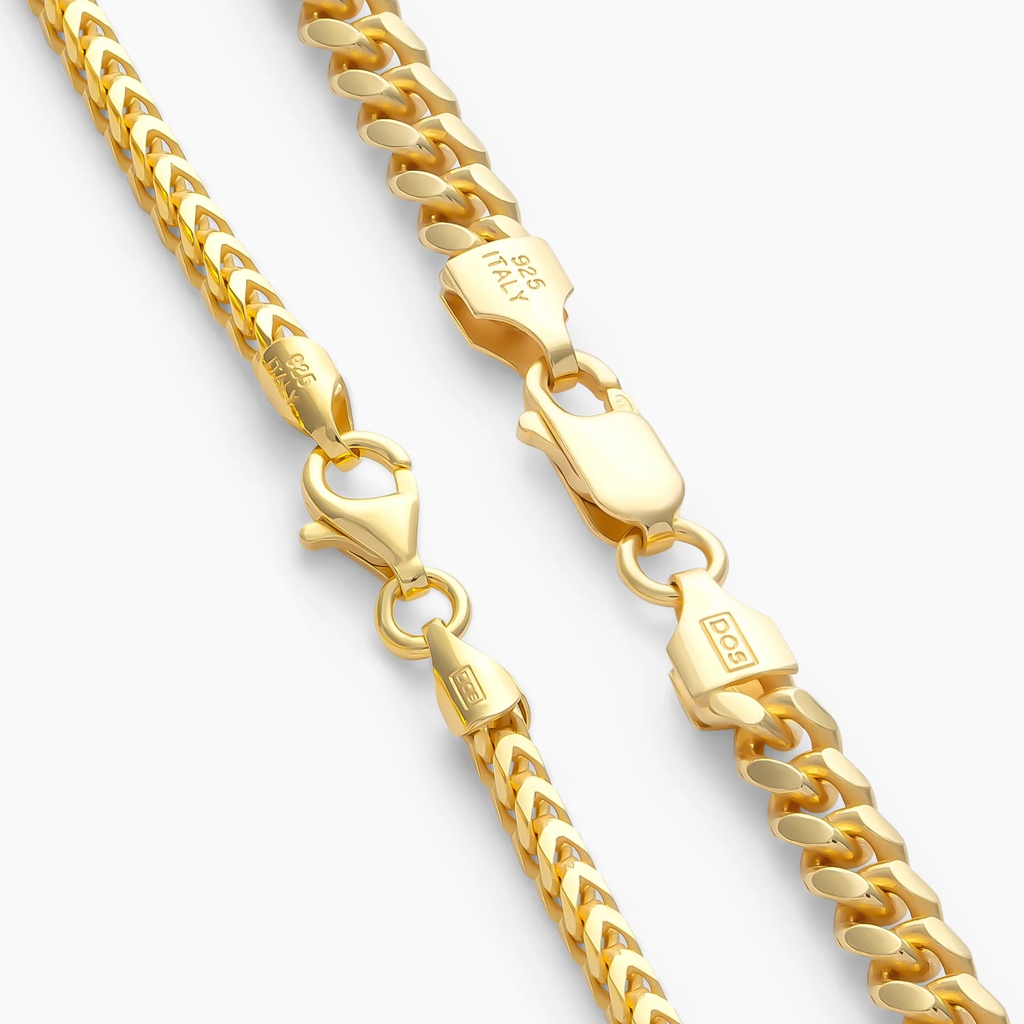Clasps on the Cuban Link + Franco chain stack in 18k gold vermeil