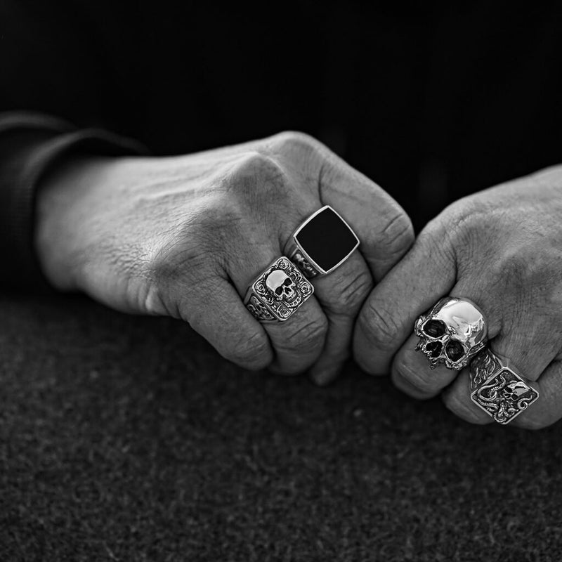 skull rose ring together with silver rings