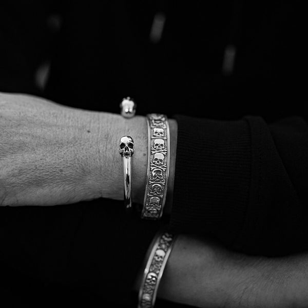small plague skull bangle